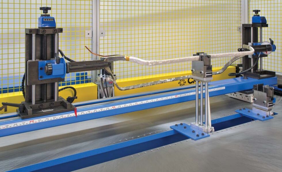 XYT MultiAxis Coil Taping Machine CAM Innovation, Inc.